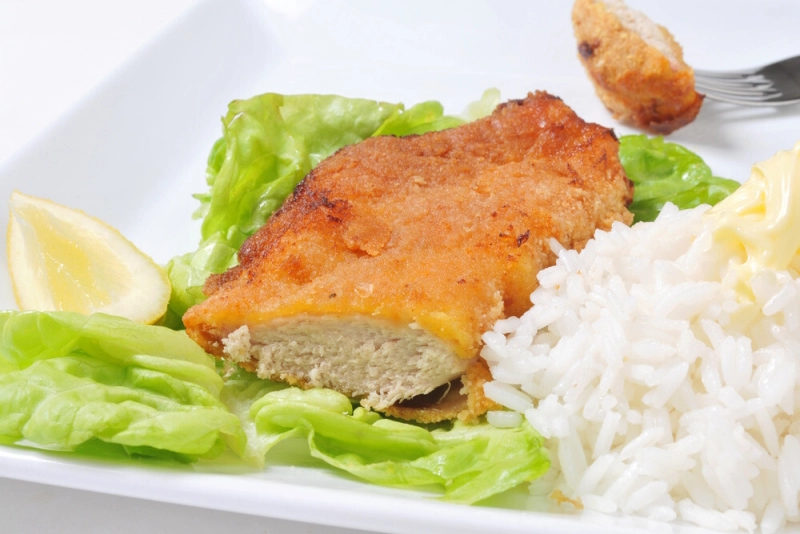 MILANESA DE POLLO C/ARROZ